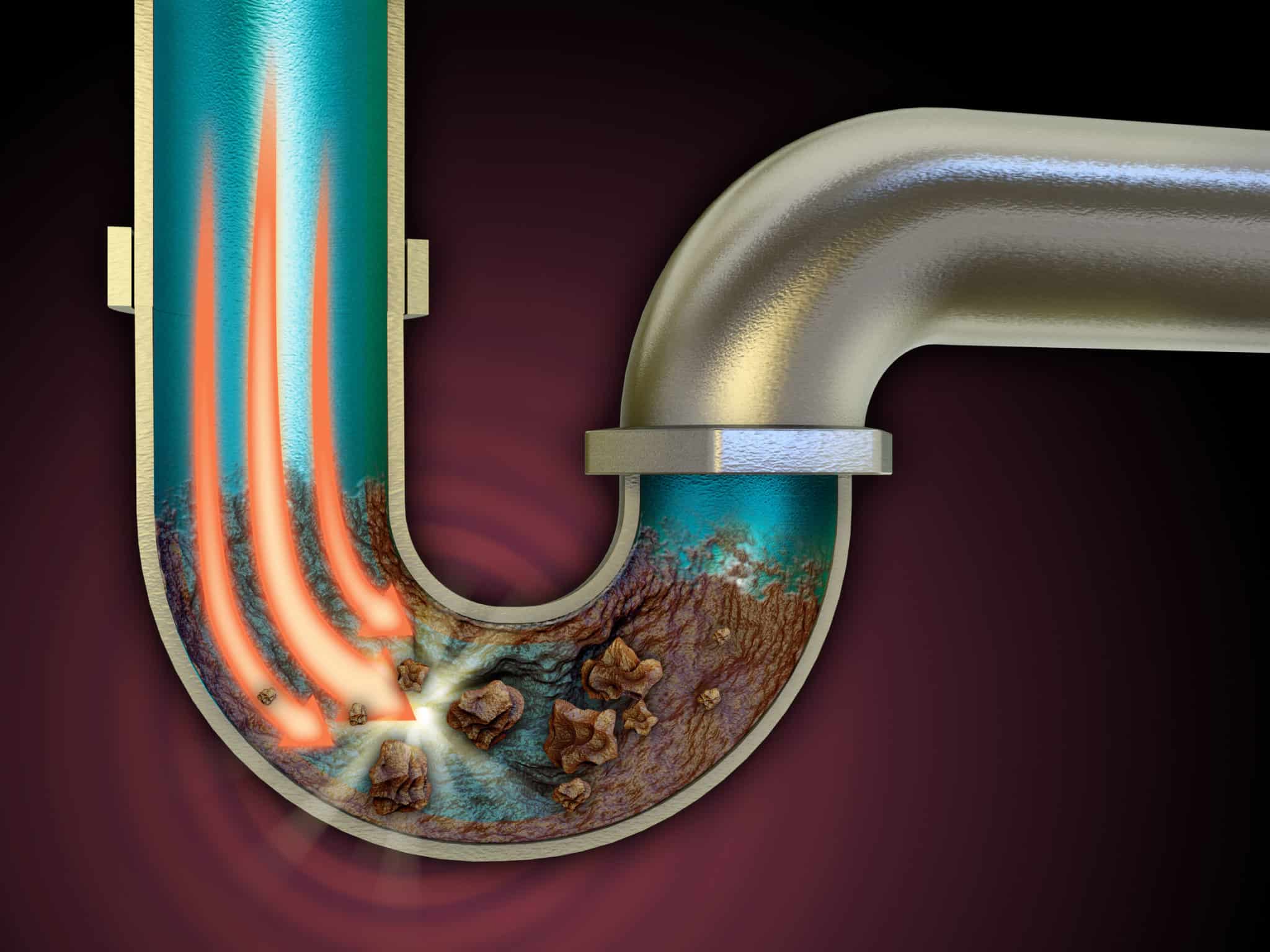 Plumber drain cleaning with a plumbing snake